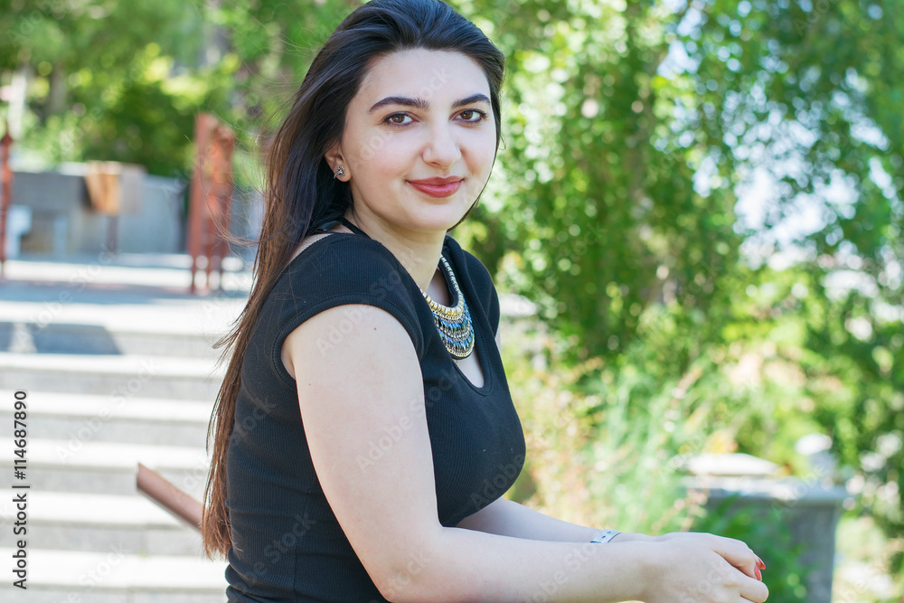 young attractive woman resting outdoors young attractive woman resting outdoors