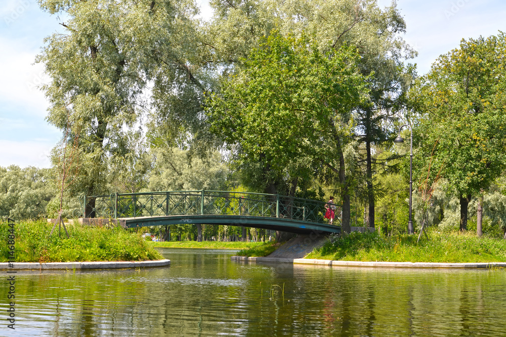 The bridge between ponds in the Moscow Victory park. St. Petersb