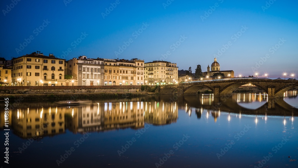 reflections in the arno river in florence