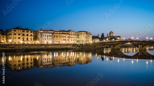 reflections in the arno river in florence