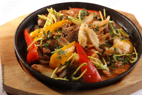 hot frying pan with beef and Mexican seasoning