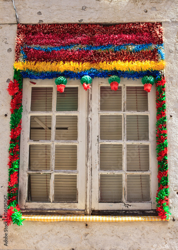 Traditional windowt with holiday decoration in Lisbon, Portugal