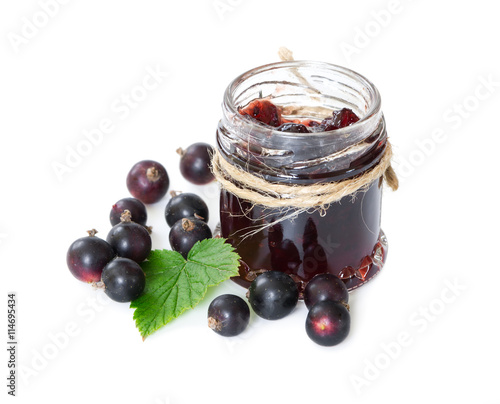 Black currant jam in glass jar