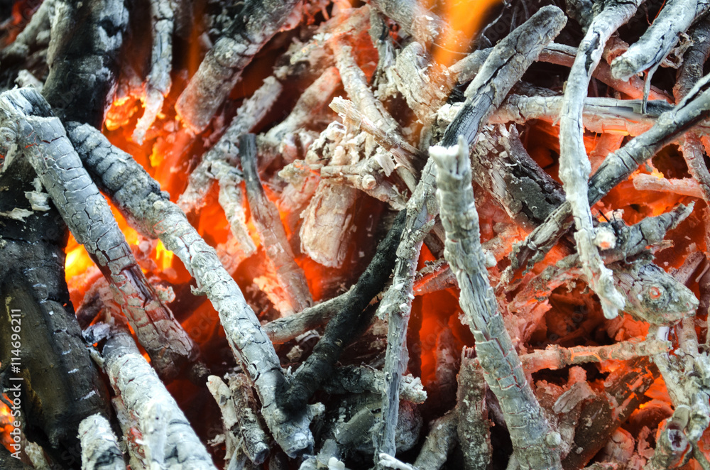 hot coals from the burnt wood
hot coals from the burnt wood