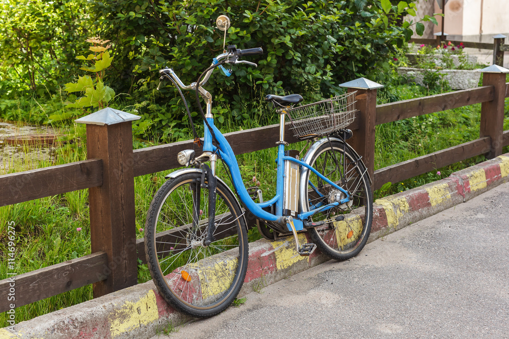 Fototapeta premium Old bicycle on the bridge. abstract river scene
