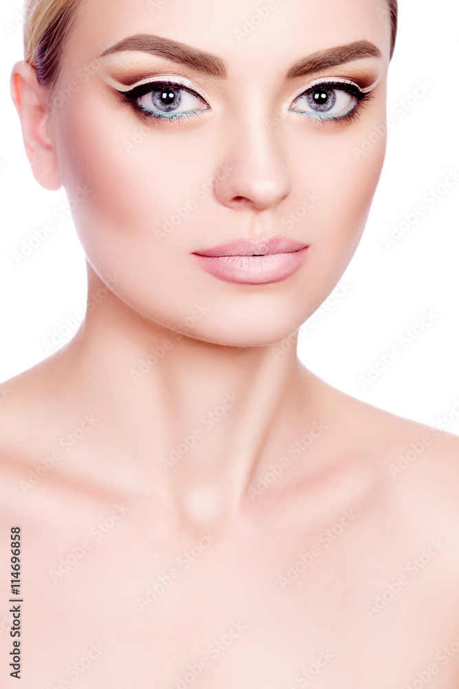 Fototapeta premium portrait of a beautiful young girl with professional makeup
