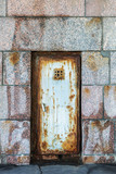 rusty door. Entrance to the prison