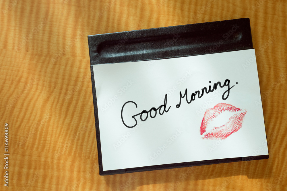 Sexy girl Red lips kiss and "Good Morning" word write on white note paper  on bed stand table in the morning light. romantic message from couple.  Stock Photo | Adobe Stock