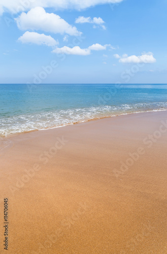 tropical beach and sea with white cloud and blue sky background in Thailand