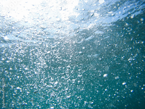 abstract underwater scene with air bubbles under water