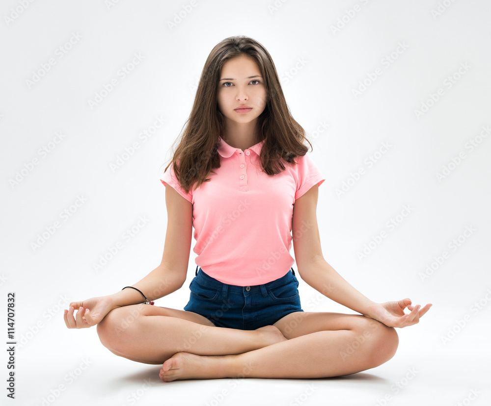 portrait of a beautiful young brunette in the studio on a white background