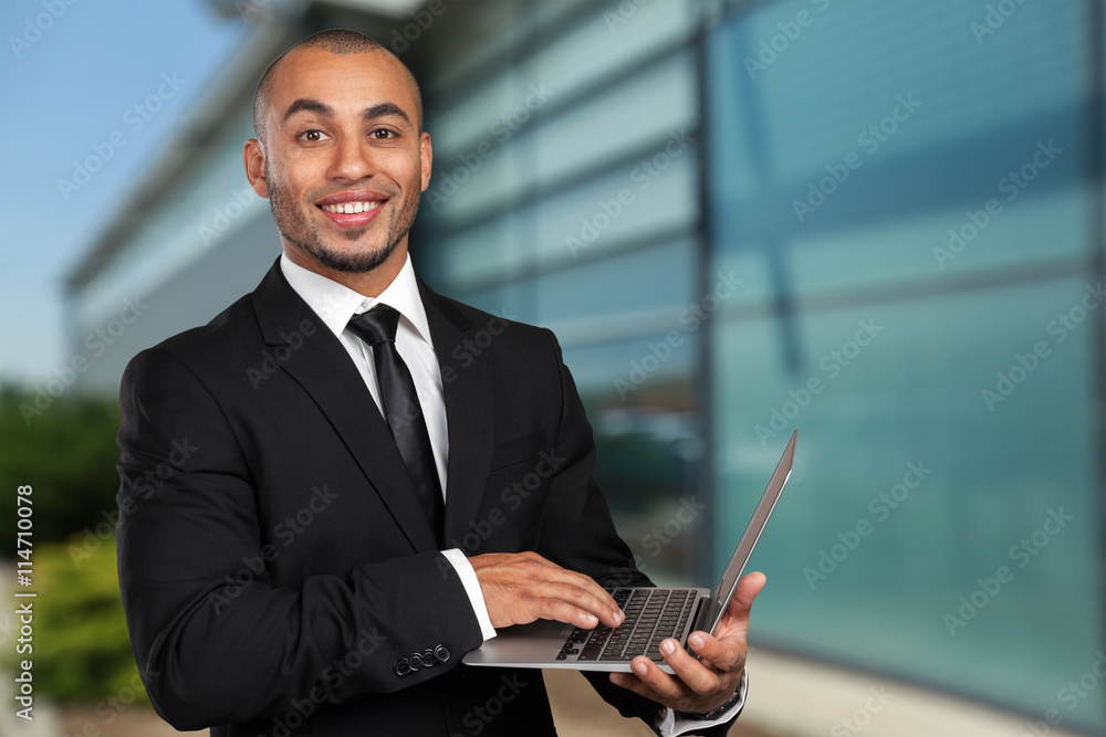 black business man with laptop black business man with laptop