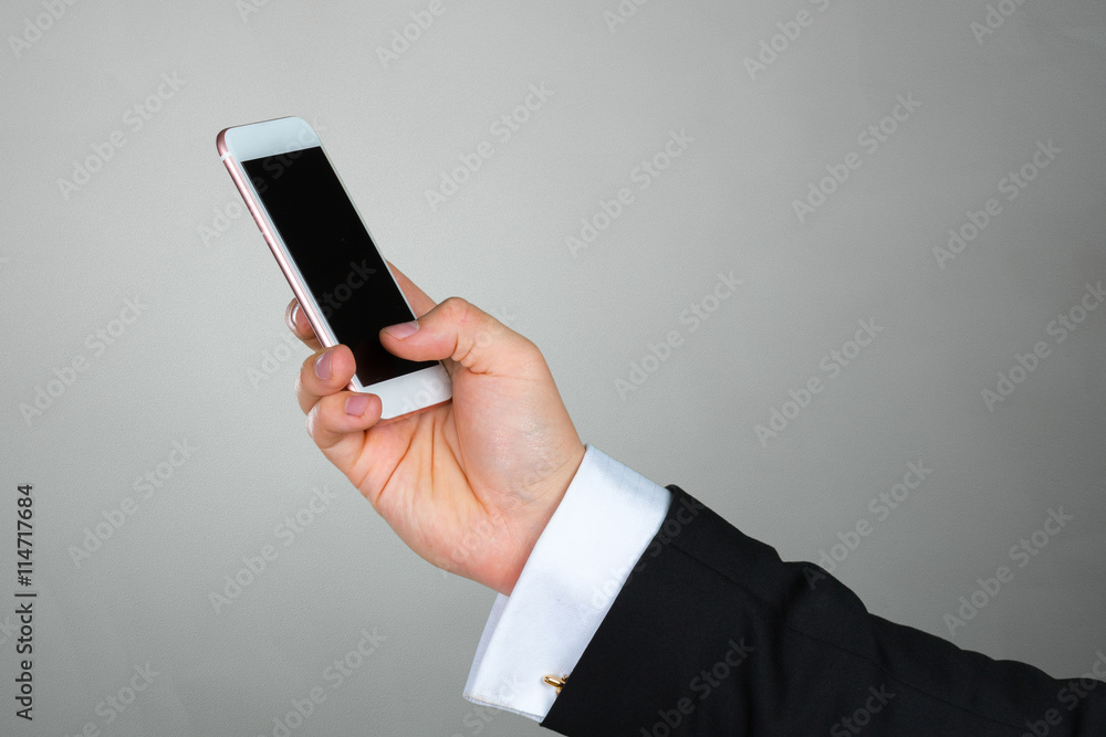Close up of a businessman using mobile smart phone Close up of a businessman using mobile smart phone