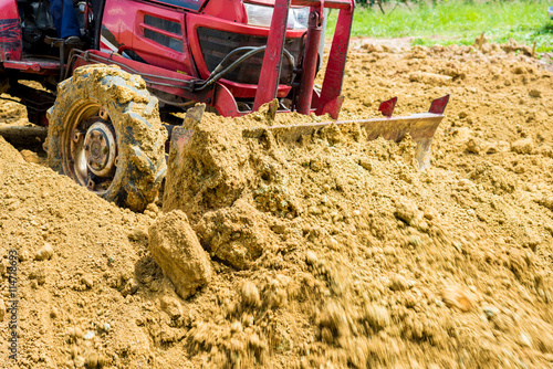 Tractor working in construction site