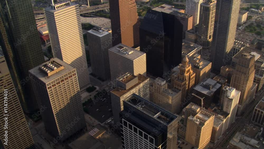 Flight over Houston skyscrapers with tilt-up to view of area beyond downtown. Shot in 2007. Flight over Houston skyscrapers with tilt-up to view of area beyond downtown. Shot in 2007.