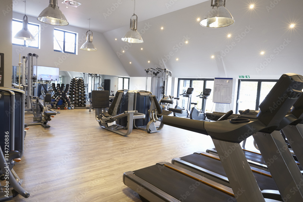 Empty gym with modern fitness equipment