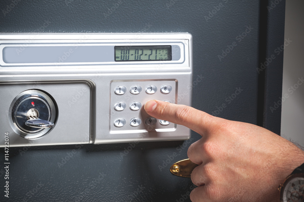 hand opened a safe, close up hand opened a safe, close up
