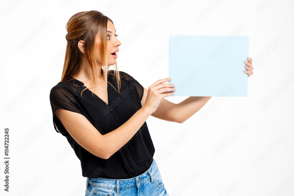 Portrait of young beautiful girl over white background. Copy space. Portrait of young beautiful girl over white background. Copy space.