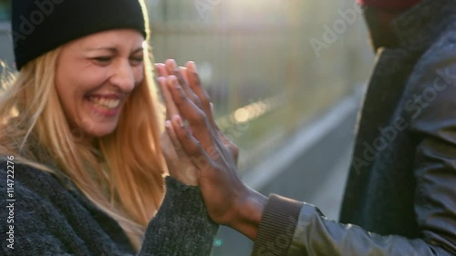 Couple touching hands
