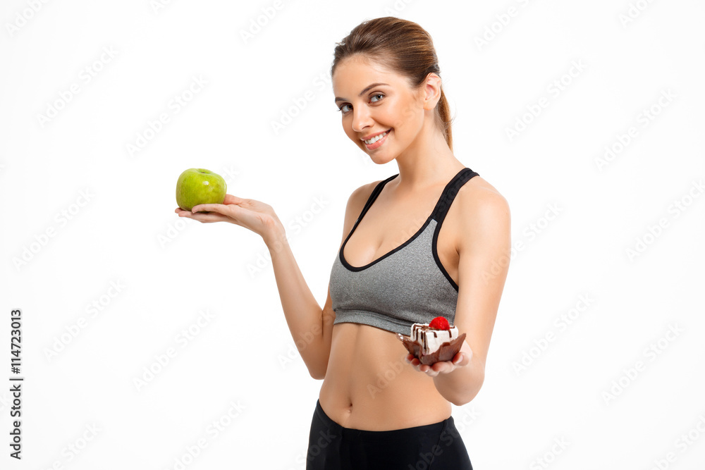 Portrait of young beautiful sportive girl over white background. Portrait of young beautiful sportive girl over white background.
