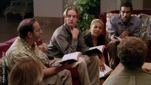 Close views of participants in adult Bible study group