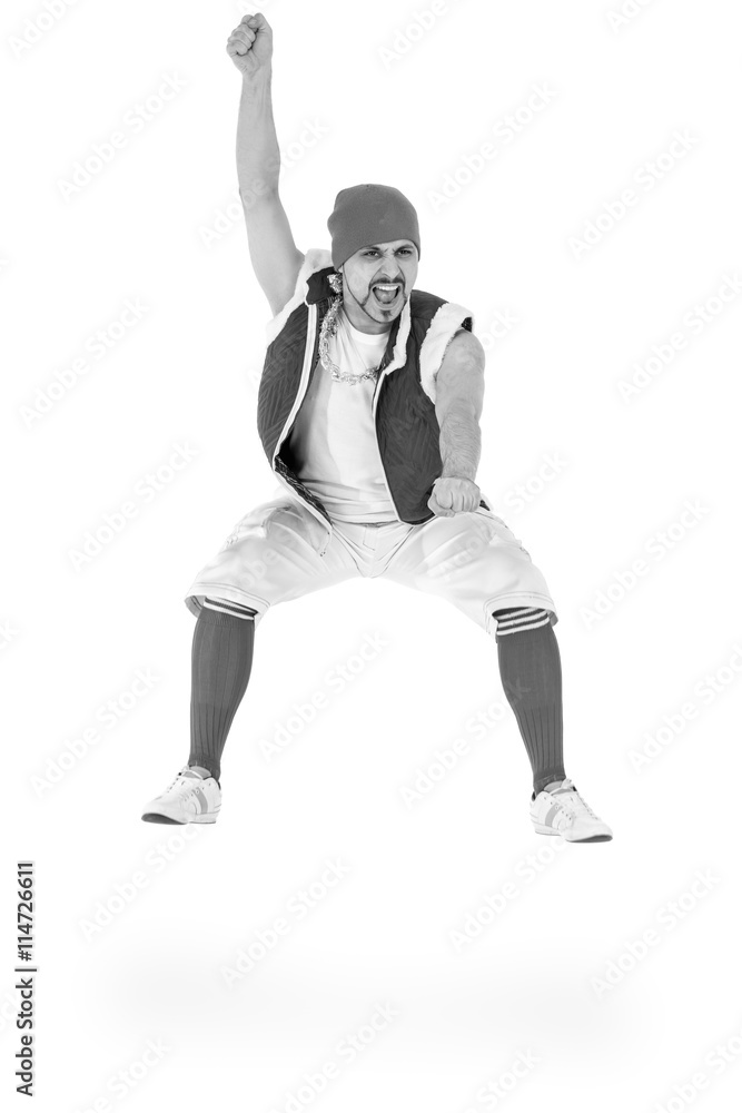 colorless portrait of friendly man dressed like a funny gnome jumping Isolated on white