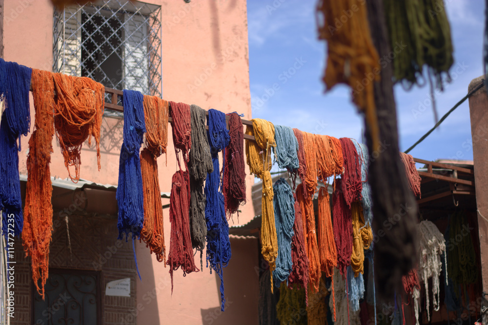 The hand-colored fabrics, laid out to dry