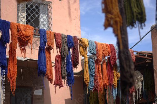 The hand-colored fabrics, laid out to dry