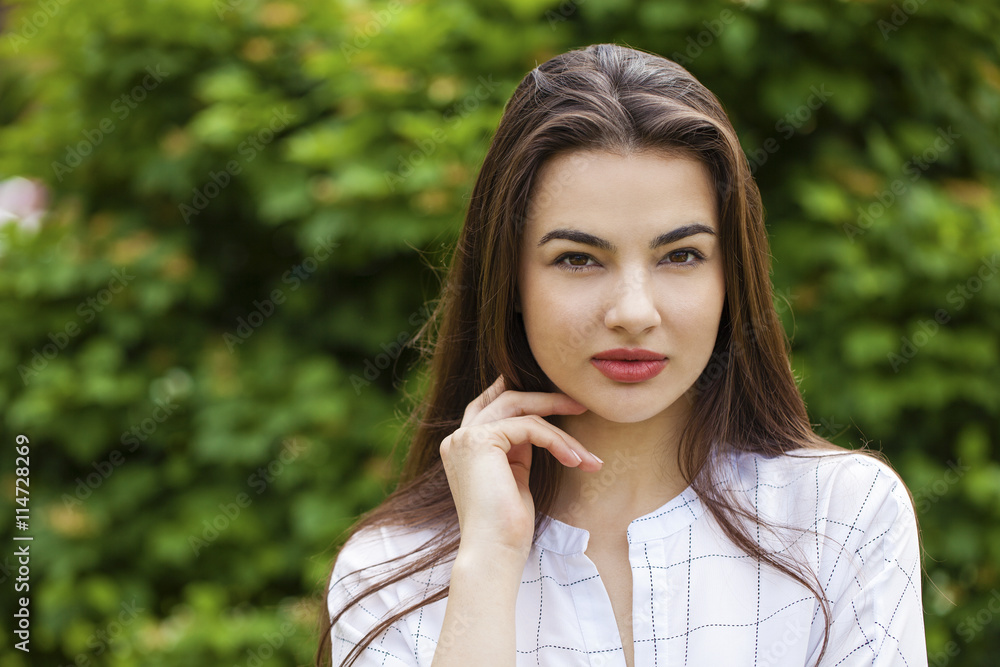 Portrait close up of young beautiful brunette woman Portrait close up of young beautiful brunette woman