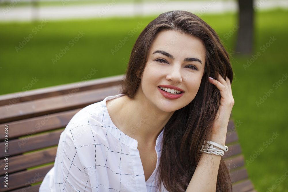 Fototapeta premium Portrait of beautiful young happy woman