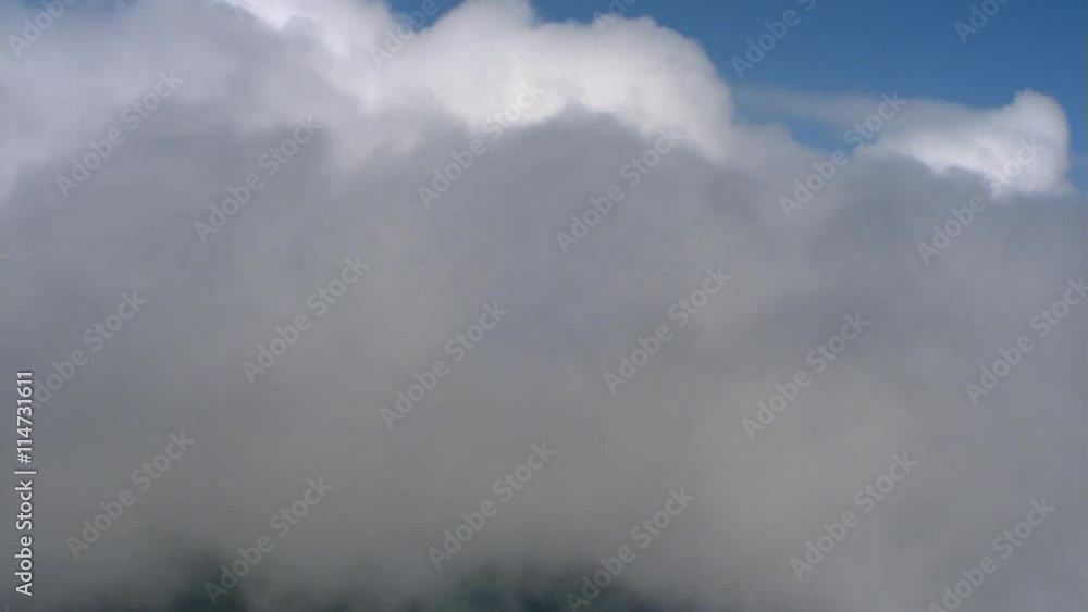 Flight through smoke-like drifting cloud mass, passenger POV Flight through smoke-like drifting cloud mass, passenger POV
