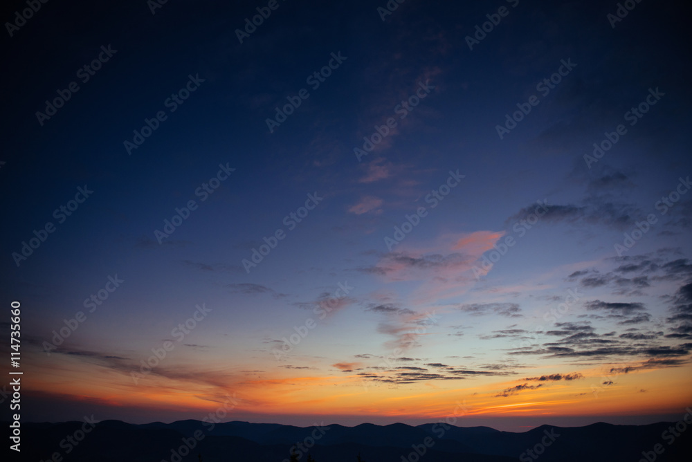 blue color of mountains during sunset. Carpathian, Ukraine.