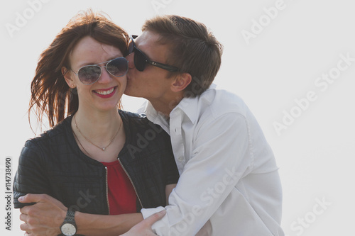 Image of beautiful couple posing on the sea