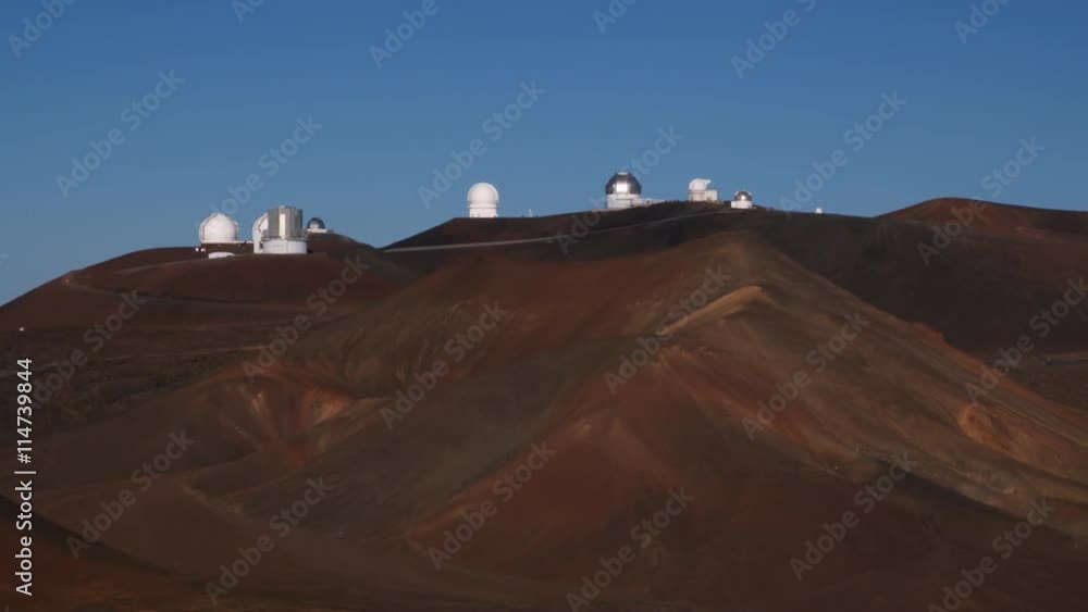 Past cinder cones on Mauna Loa with observatory in background. Shot in 2010. Past cinder cones on Mauna Loa with observatory in background. Shot in 2010.