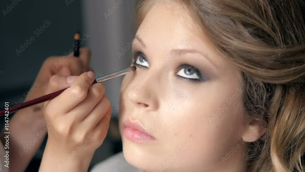 Makeup. Make-up. Eyeshadows. Eye shadow brush, eye lid, smockey eyes and hairstyle Makeup. Make-up. Eyeshadows. Eye shadow brush, eye lid, smockey eyes and hairstyle