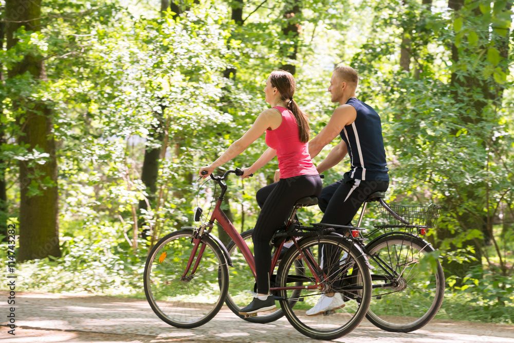Young Couple Riding Bicycles