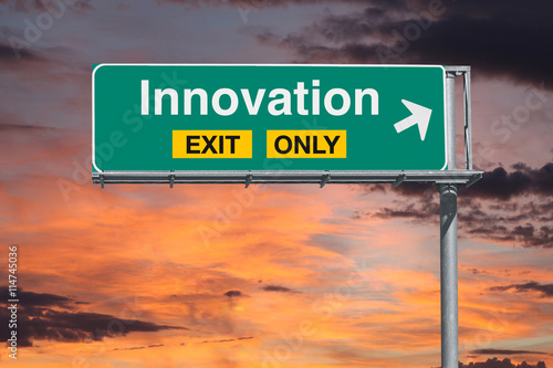 Innovation Exit Only Freeway Sign with Sunrise Sky