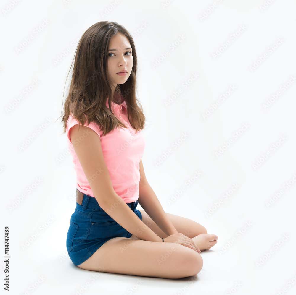 portrait of a beautiful young brunette in the studio portrait of a beautiful young brunette in the studio