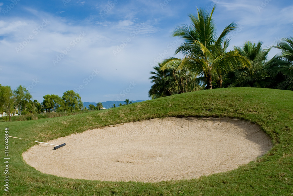 Sand trap on a tropical golf course