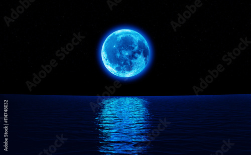 Full moon over cold night water