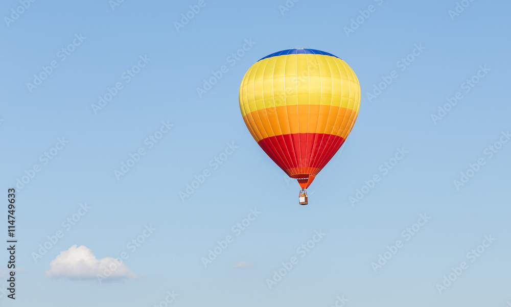 Colorful hot air balloon on blue sky Colorful hot air balloon on blue sky