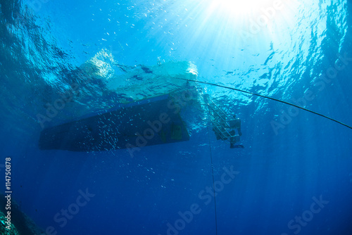 Sun and Boat from underwater
