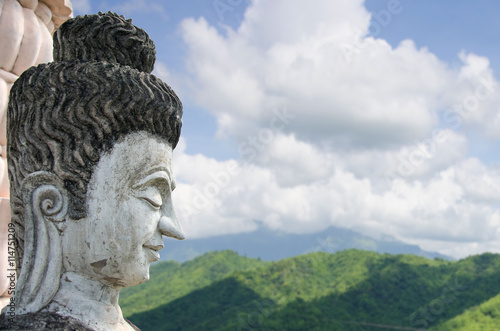Head of Buddha statue © bandung
