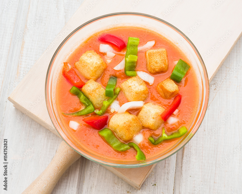 aerial view of gazpacho soup with vegetables and croutons in rou aerial view of gazpacho soup with vegetables and croutons in rou