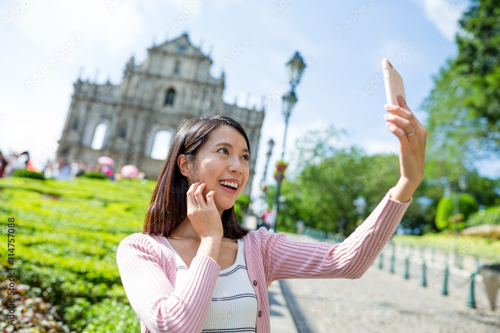 Fototapeta premium Woman taking selfie image in Macau city