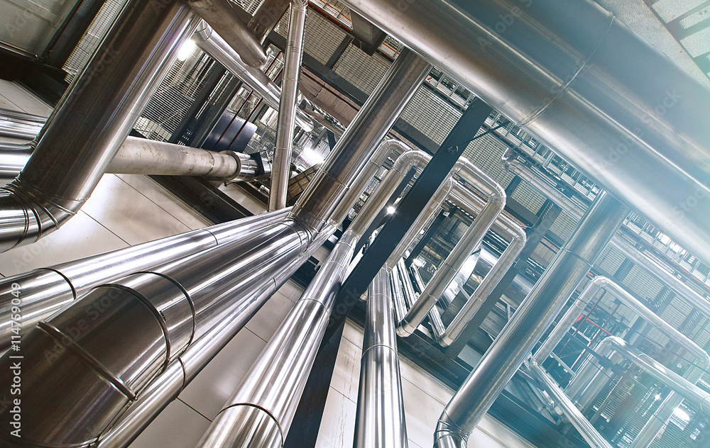 Obraz premium Industrial zone, Steel pipelines, valves and pumps