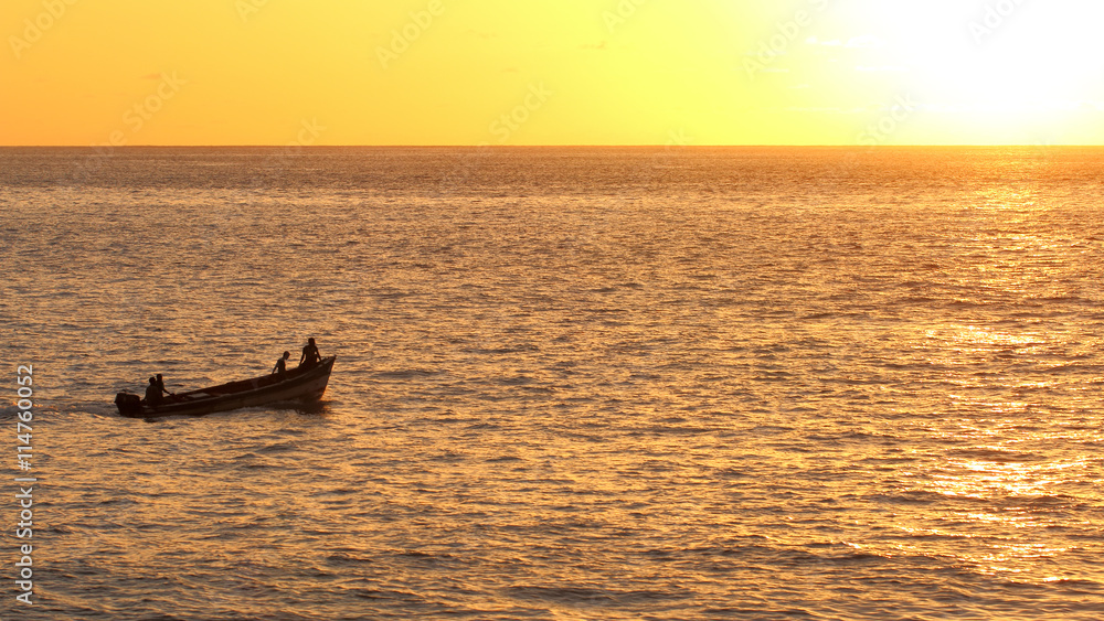Boat at sunset in Atlantic