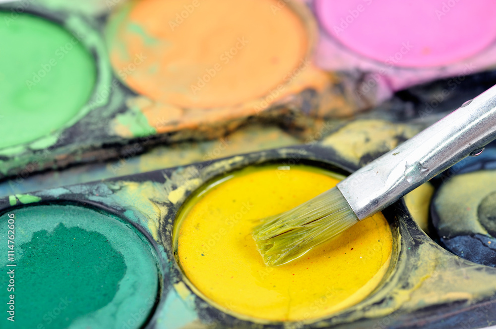 Obraz premium Watercolors and paintbrush