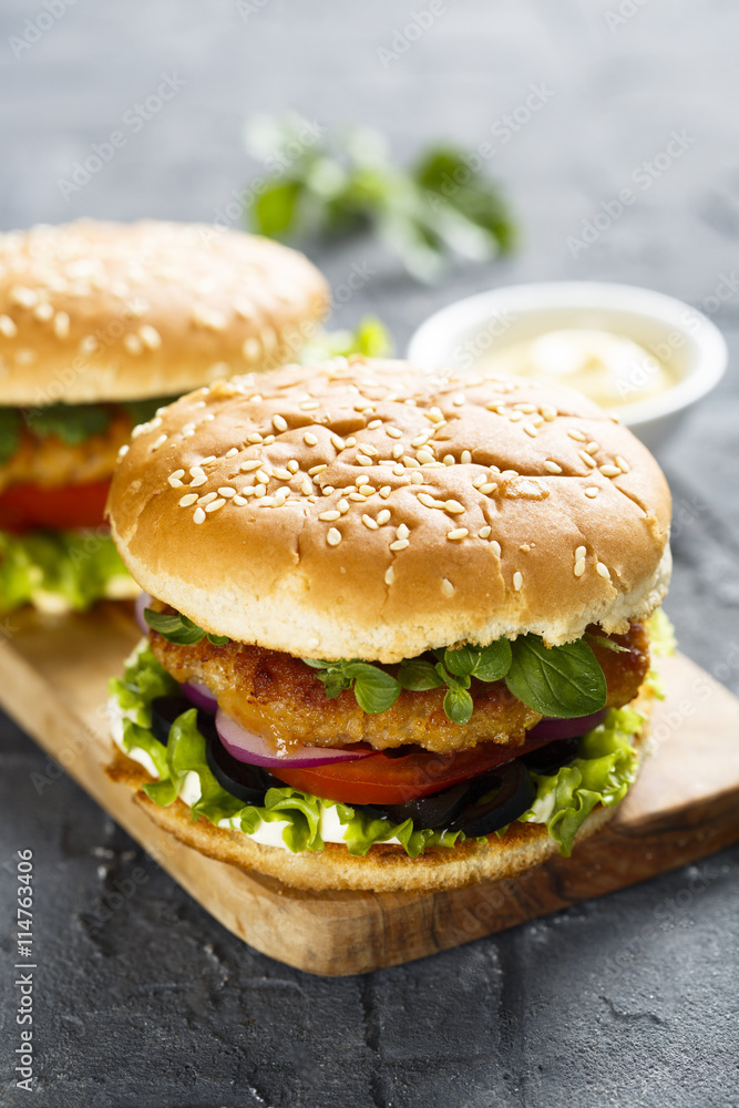 Burger with chicken and olives Burger with chicken and olives