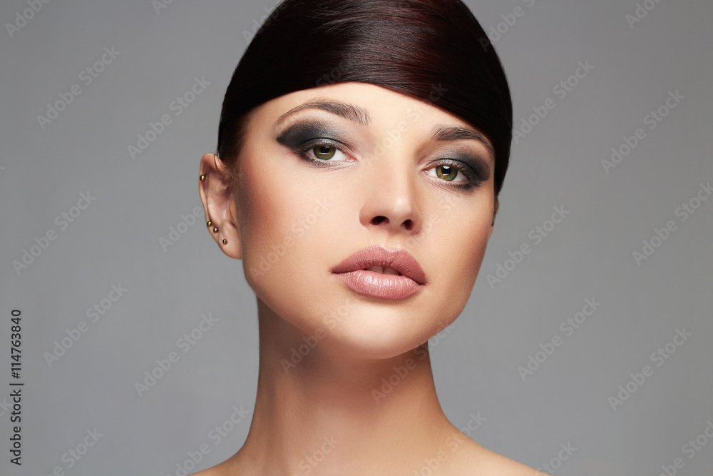 Naklejka premium Beautiful Girl.Hairstyle.Makeup. young beauty Woman with shiny Hair